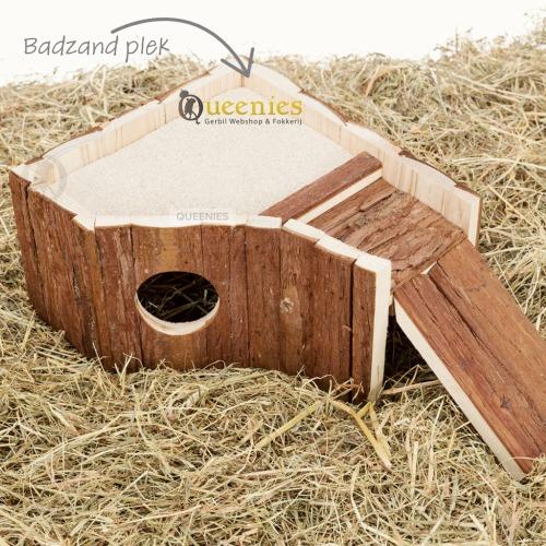 Badzandhuisje van hout met plat dak